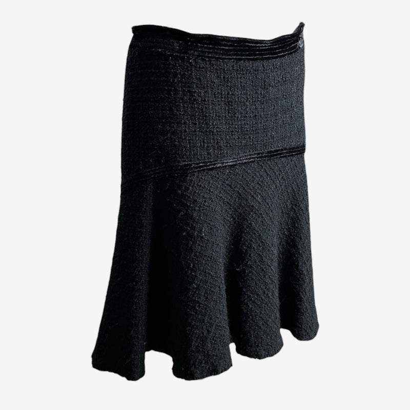 Black wool flare skirt by Roberto Cavalli, back view with exposed vertical center seam raw-edge treatment
