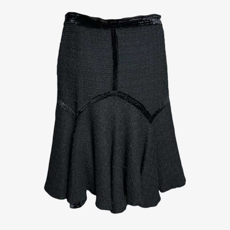 Black wool flare skirt by Roberto Cavalli, detail of pronounced flare hem and textured wool construction