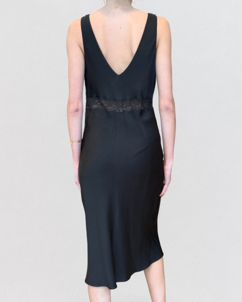 Black dress by Christian Dior John Galliano, hem detail and fabric construction