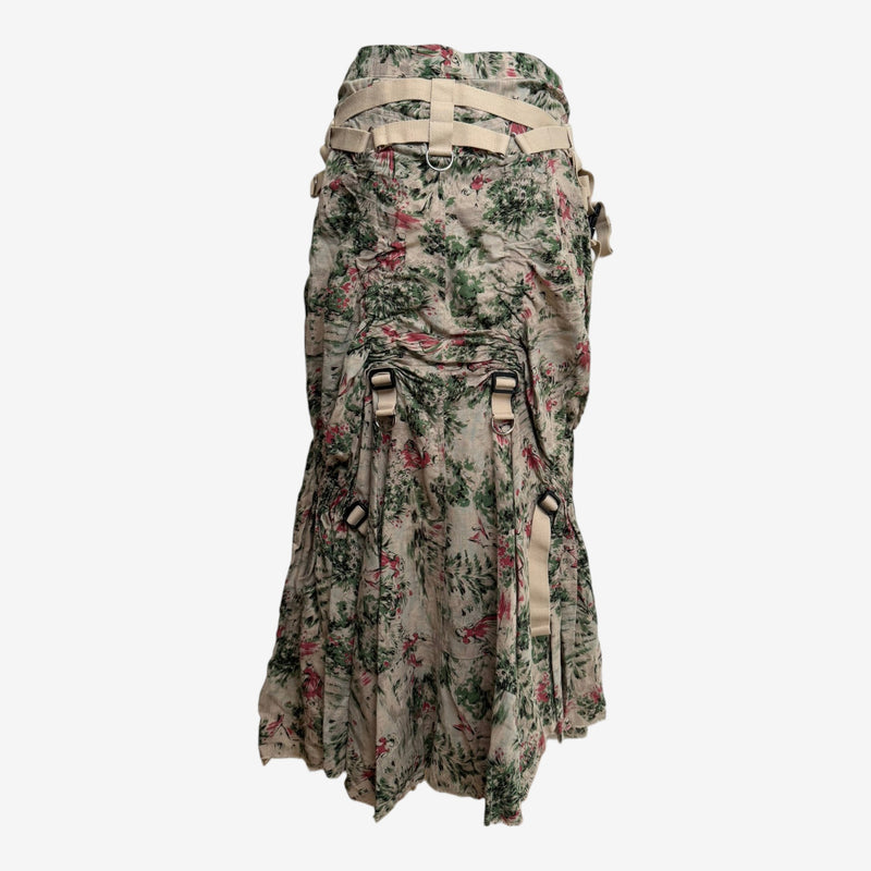 Asymmetrical handkerchief hem with raw edge finish on parachute skirt