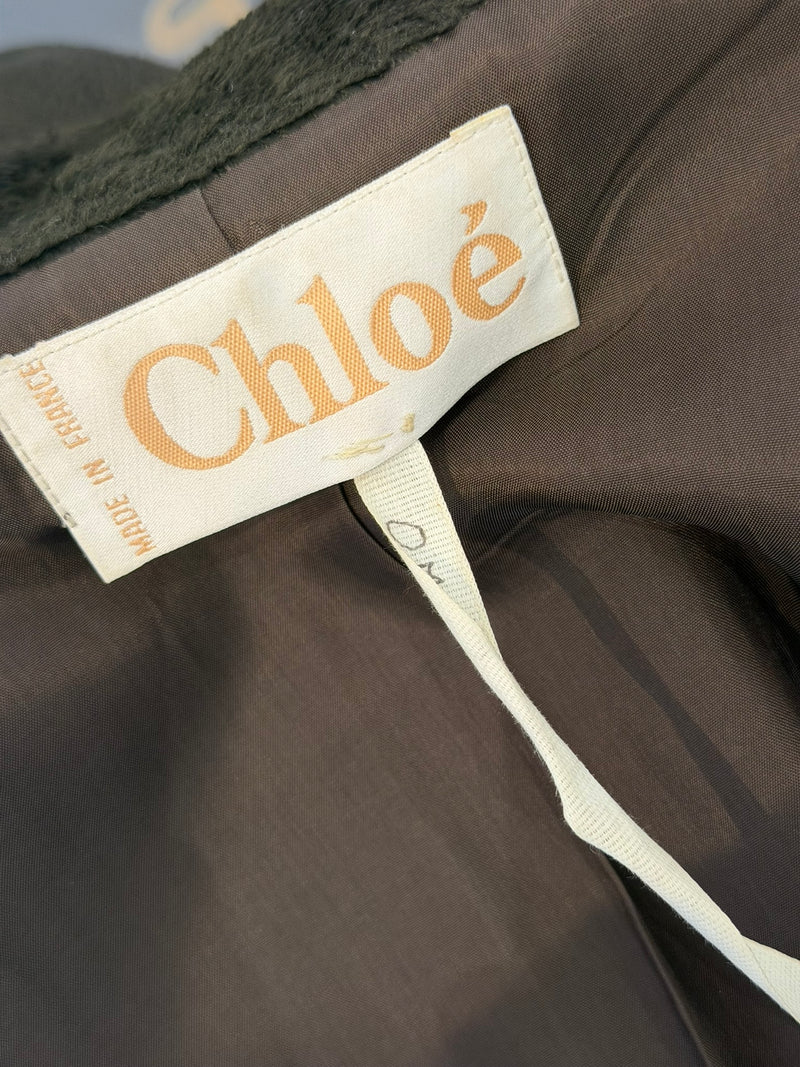 Olive green faux fur coat by Chloé, interior taupe lining with Chloé label visible