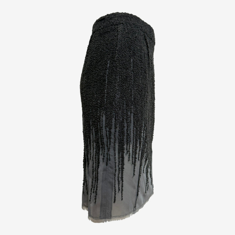 Black wool boucle skirt by Christian Dior, fringe detail with gradient effect from dense to sparse