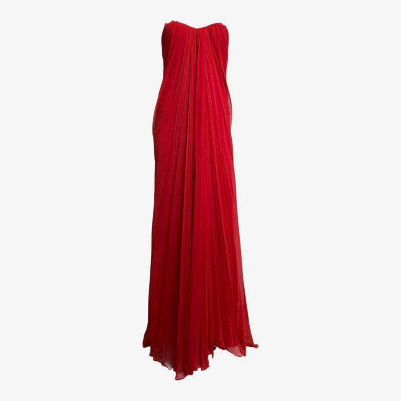 Red pleated silk chiffon strapless gown by Alexander McQueen, floor-length with sweetheart neckline