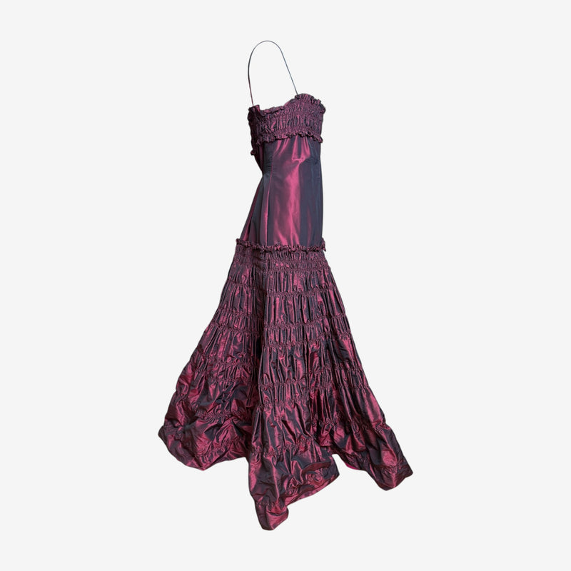 Fabric detail showing iridescent taffeta shift between burgundy and magenta