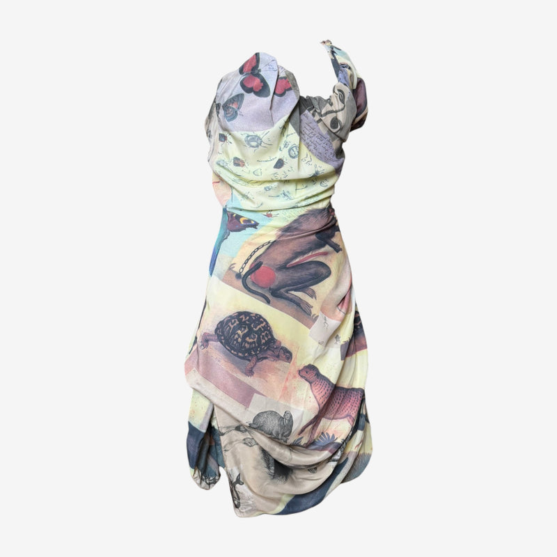 Back view of cream and lavender Vivienne Westwood draped dress showing asymmetrical gathered skirt