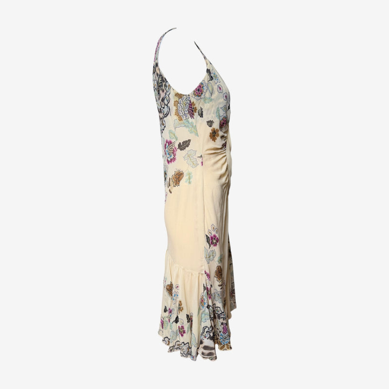 Roberto Cavalli slip dress rear view, showing fitted bodice and flared midi-length skirt with ruffled hem
