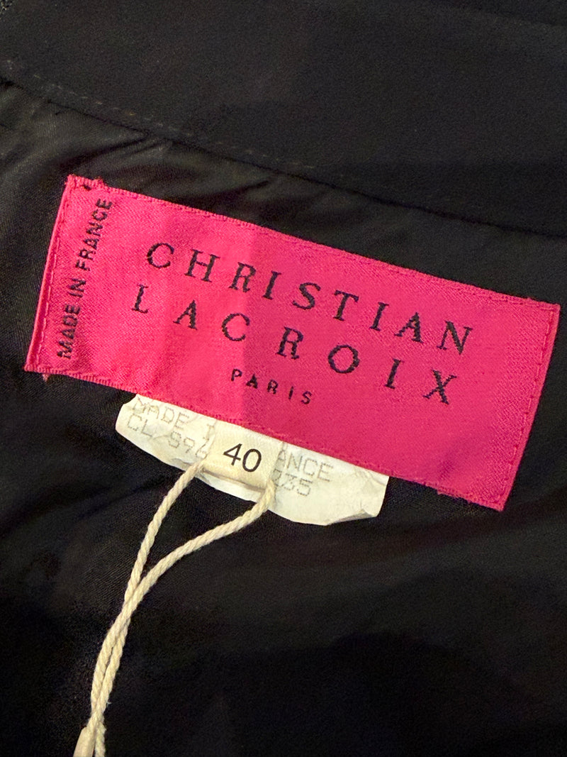 Black halter gown by Christian Lacroix, back view showing open back and twisted knot detail