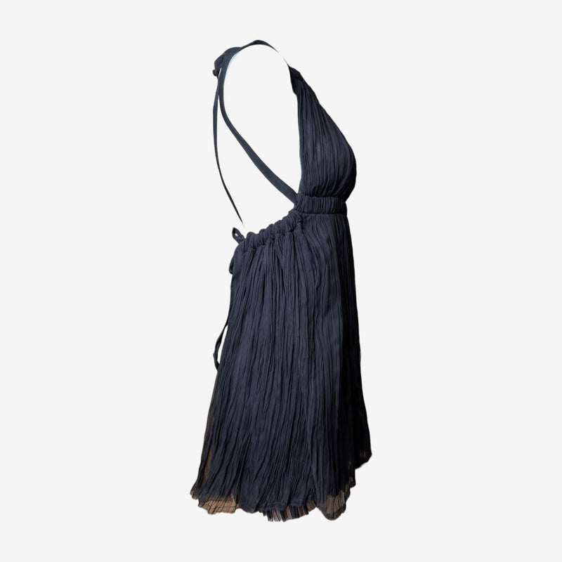 Charcoal black pleated silk mini dress by Fendi, back view showing open construction with crossing straps