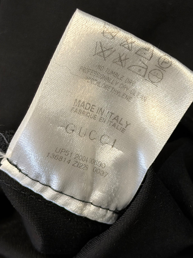 Black ruched jersey midi dress by Gucci Tom Ford, detail view of neckline gathering