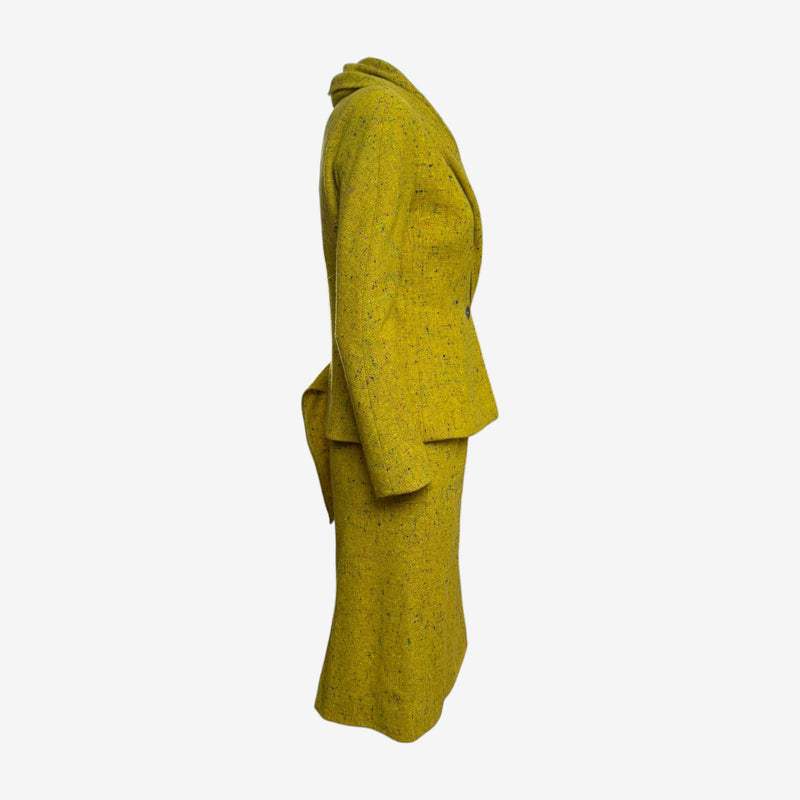 Side view of Christian Dior John Galliano chartreuse tweed suit, fitted silhouette with draped collar