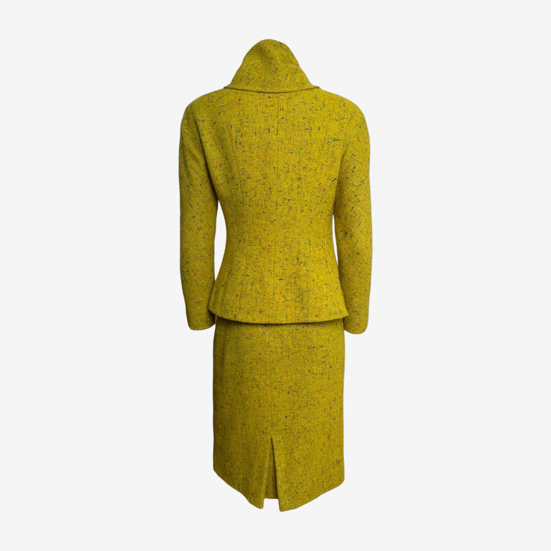 Back view of Christian Dior John Galliano tweed blazer and pencil skirt, center-back kick pleat