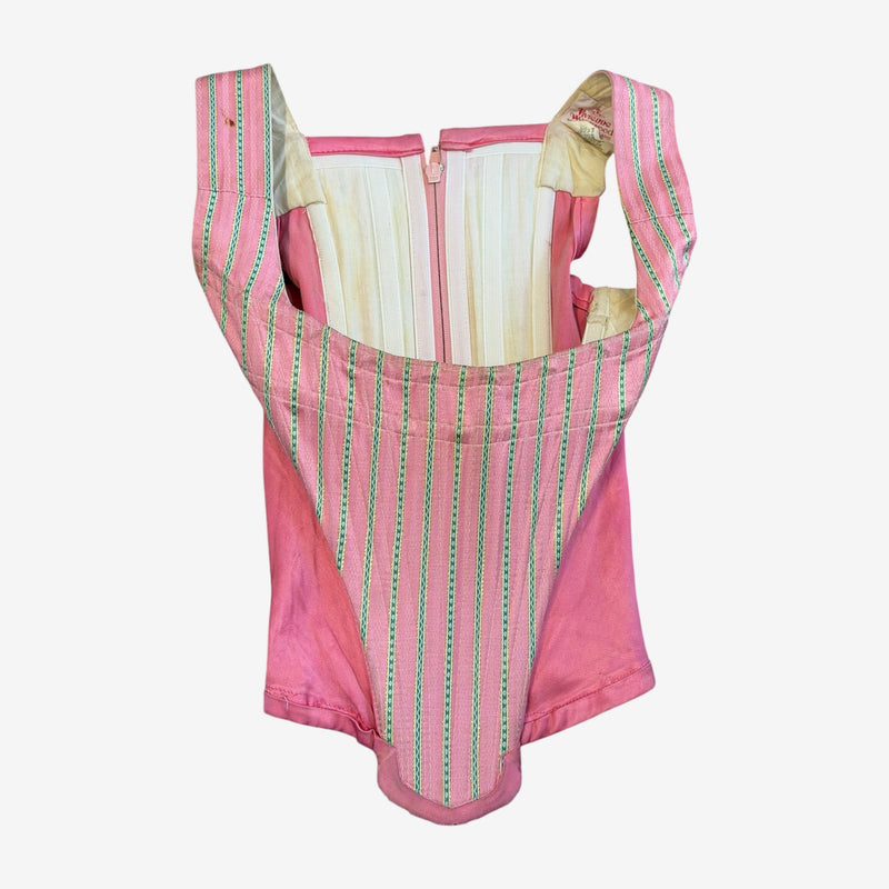 Pink striped corset bustier by Vivienne Westwood, front view with green and gold woven trim