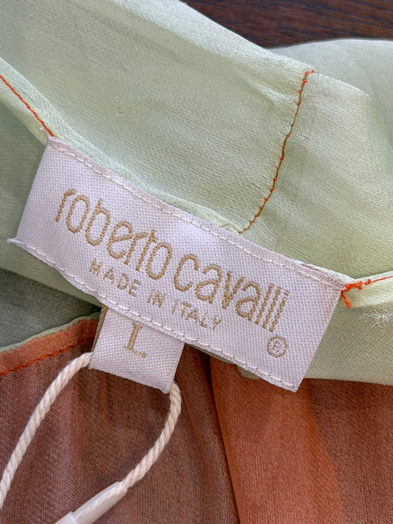Asymmetrical hem and flowing panels on Roberto Cavalli gradient silk blouse