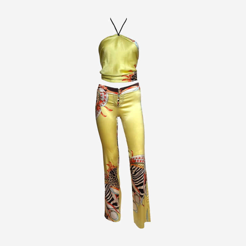 Yellow silk halter top by Roberto Cavalli with tropical flower and animal print, braided leather neck straps