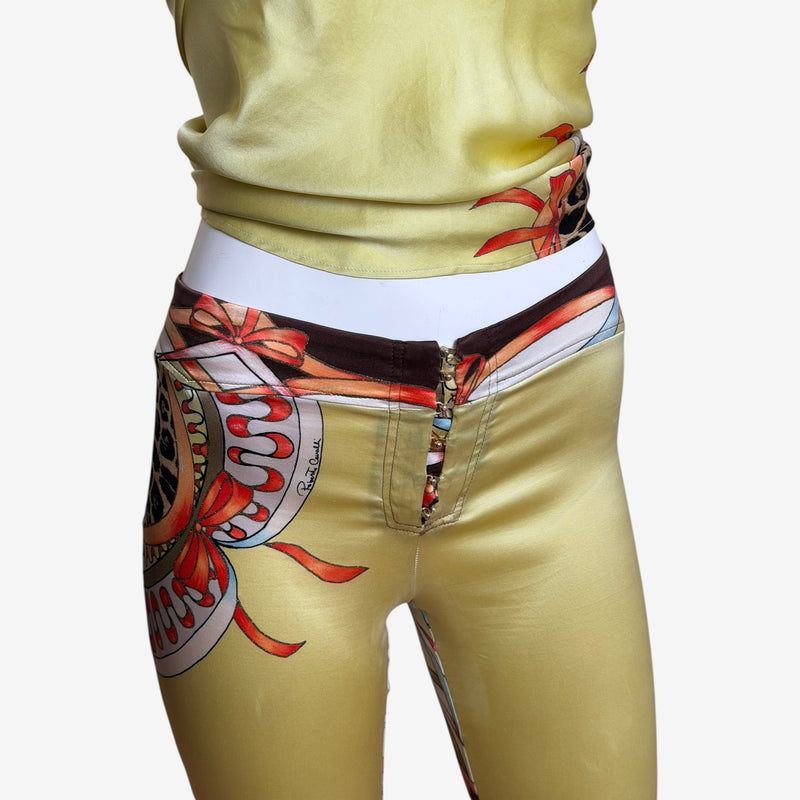 Yellow silk halter top by Roberto Cavalli, braided leather straps detail, cropped wraparound fit