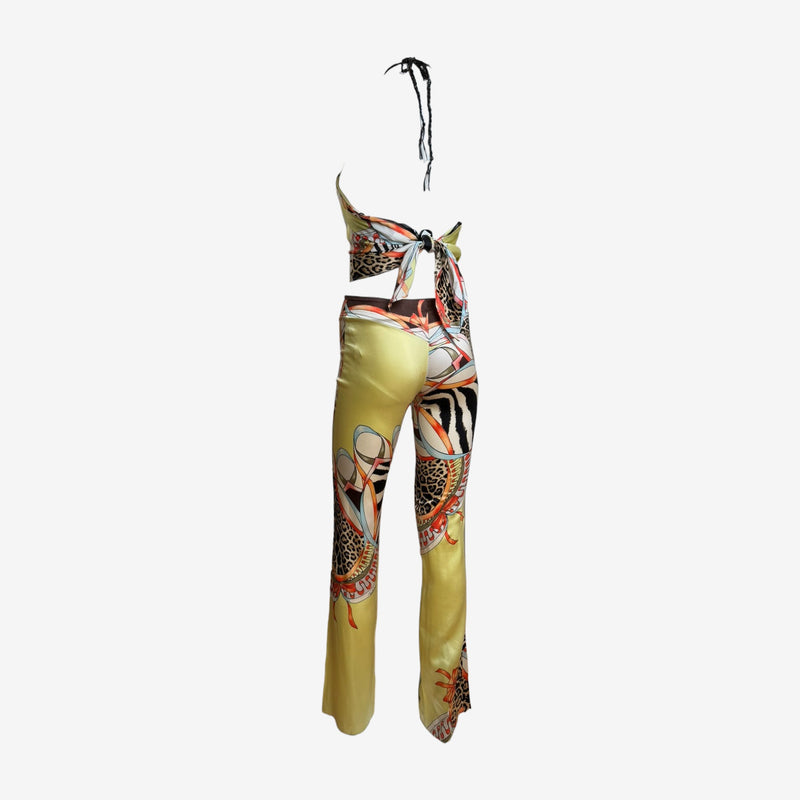 Yellow silk pants by Roberto Cavalli, zebra and leopard stripe print, fitted hip with flare
