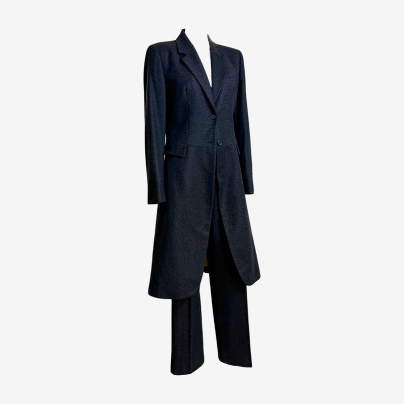 Charcoal tailcoat jacket detail showing silk lining with yellow trim accent