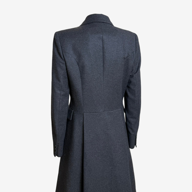 Trousers waistband detail with high-waisted construction and side adjusters