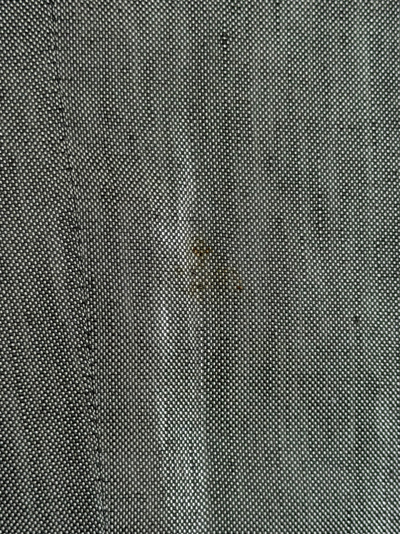 Grey iridescent wool suit trousers by Alexander McQueen, inseam and hem detail