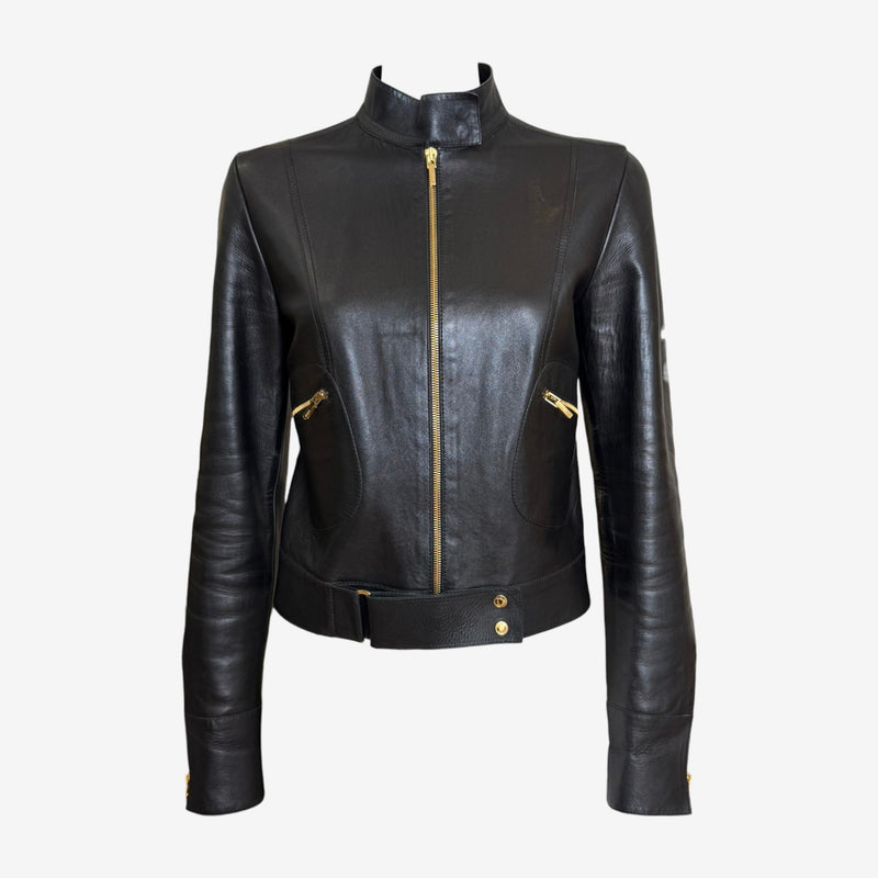 Black leather moto jacket by Gucci, fitted silhouette with asymmetrical zip closure