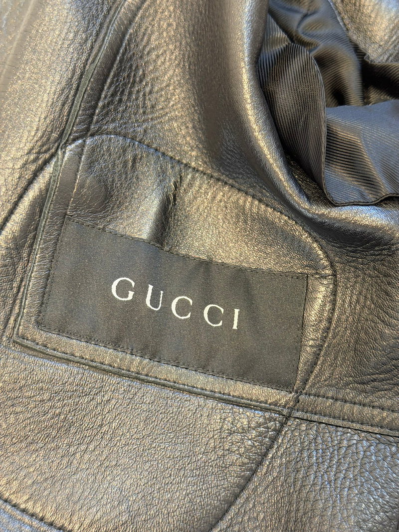 Black lambskin moto jacket cuff and sleeve detail with horizontal quilting