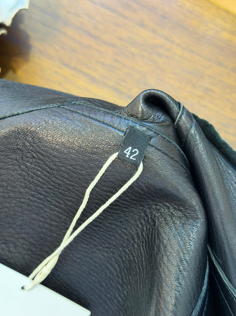 Black moto jacket interior lining with Gucci label from Tom Ford era
