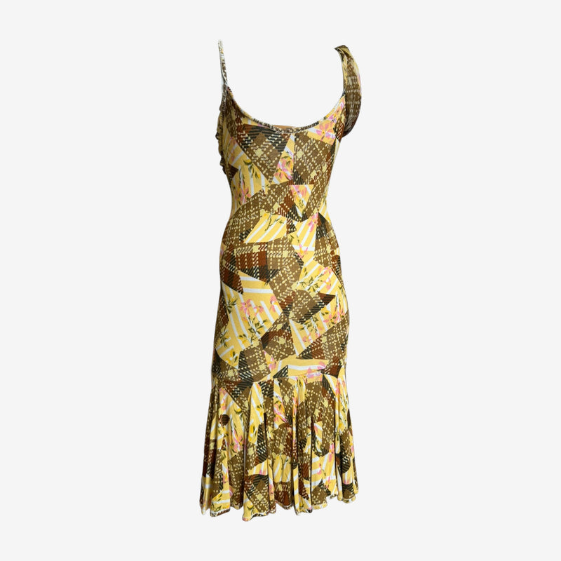 John Galliano dress with asymmetrical ruffle detailing at hem, back view