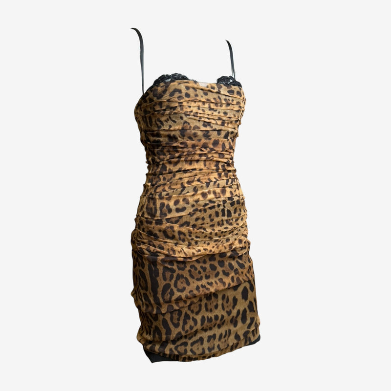 Detail of black lace trim and adjustable shoulder straps on Dolce & Gabbana leopard dress