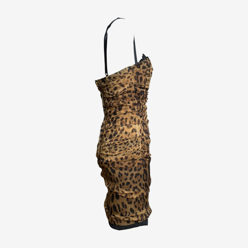 Back view of Dolce & Gabbana leopard print bustier dress showing ruching and zip closure