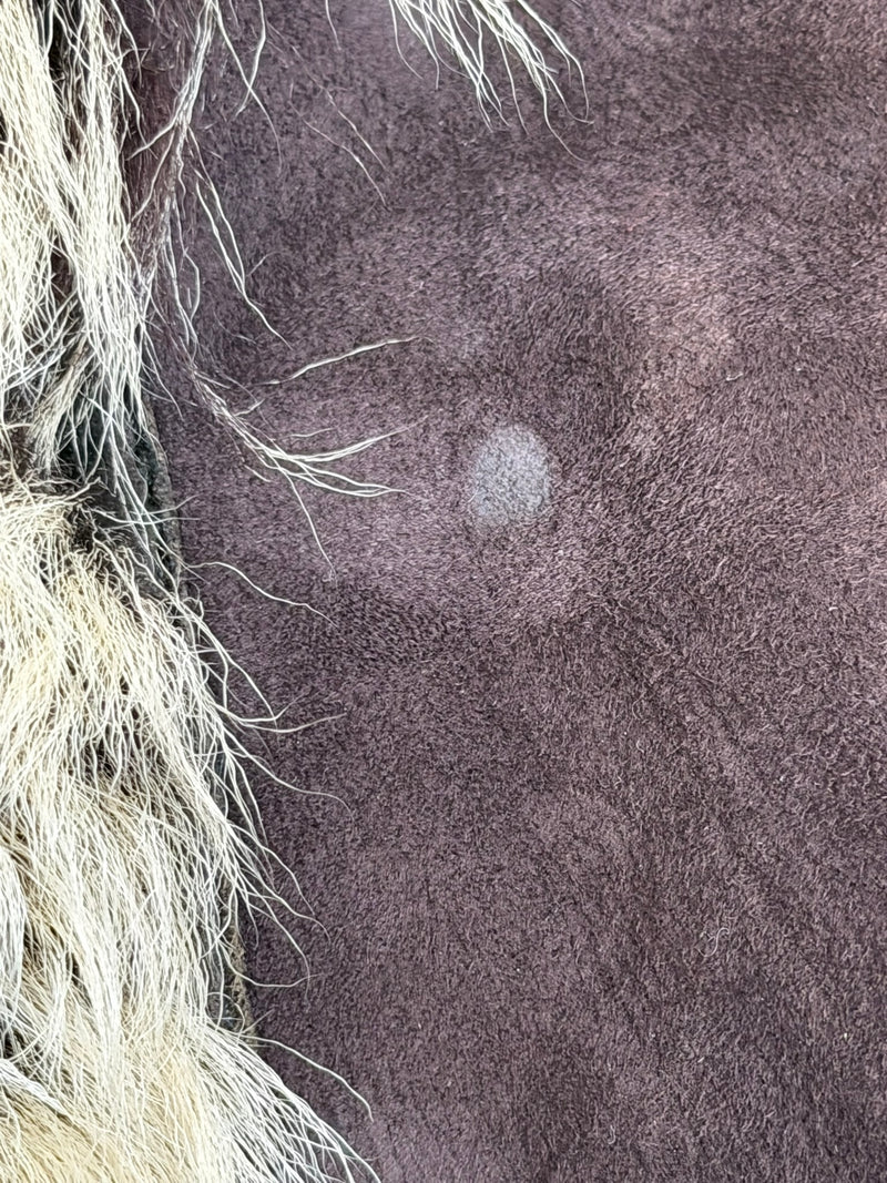 Brown shearling coat by Gucci Tom Ford, condition detail showing marking