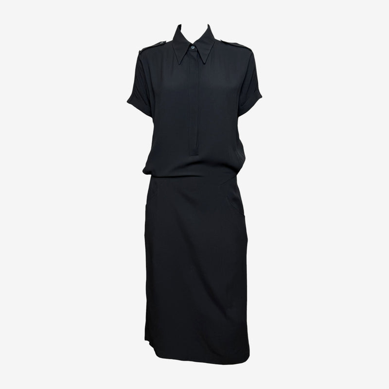 Black wool gabardine military shirt dress by Alexander McQueen, front view with half-zip closure and epaulettes