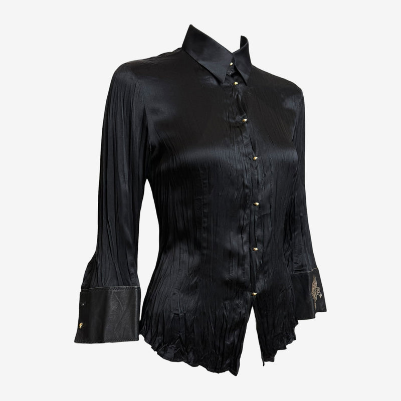 Cream silk shirt by Roberto Cavalli, detail of embroidered sacred heart motif with flame on leather cuff panel