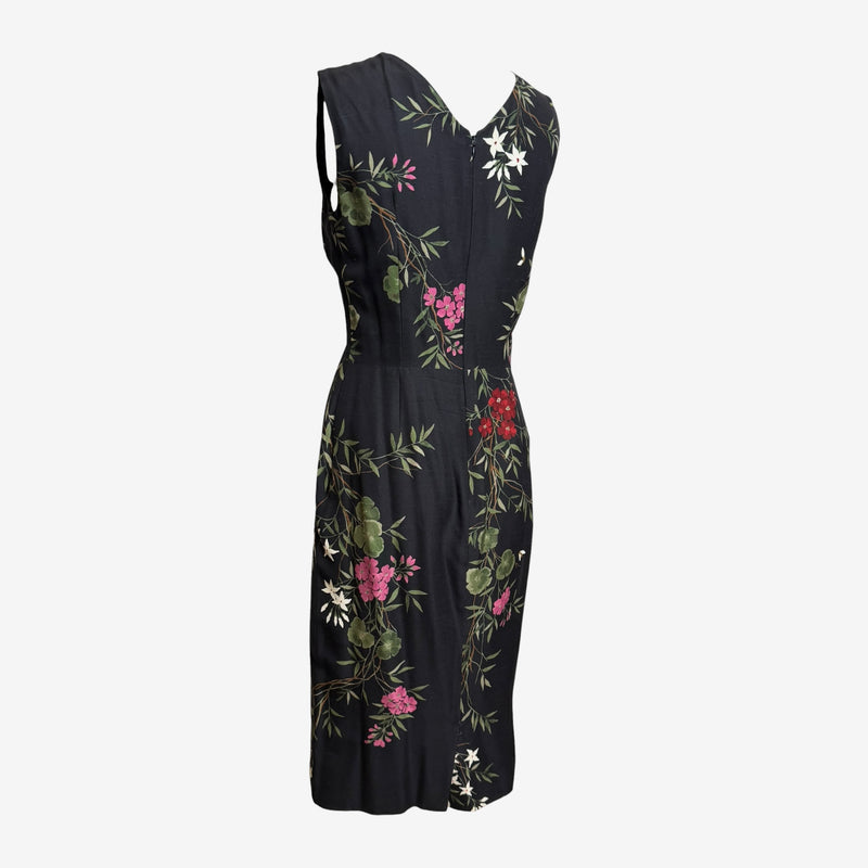 Black silk sheath dress by Dolace & Gabbana, full-length front view on form