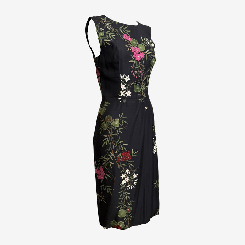Black silk sheath dress by Dolce & Gabbana, side wrap waist detail with button closure