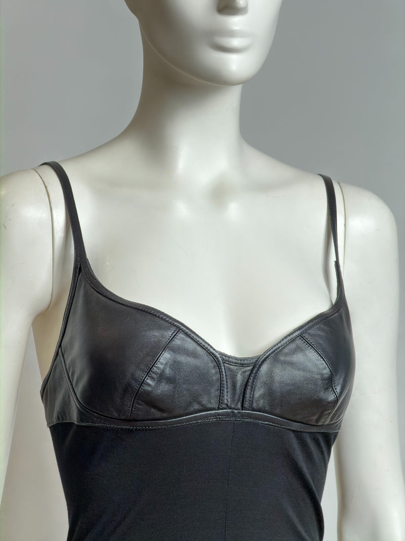 Black draped leather-cup dress by Alexander McQueen, back view with gathered folds
