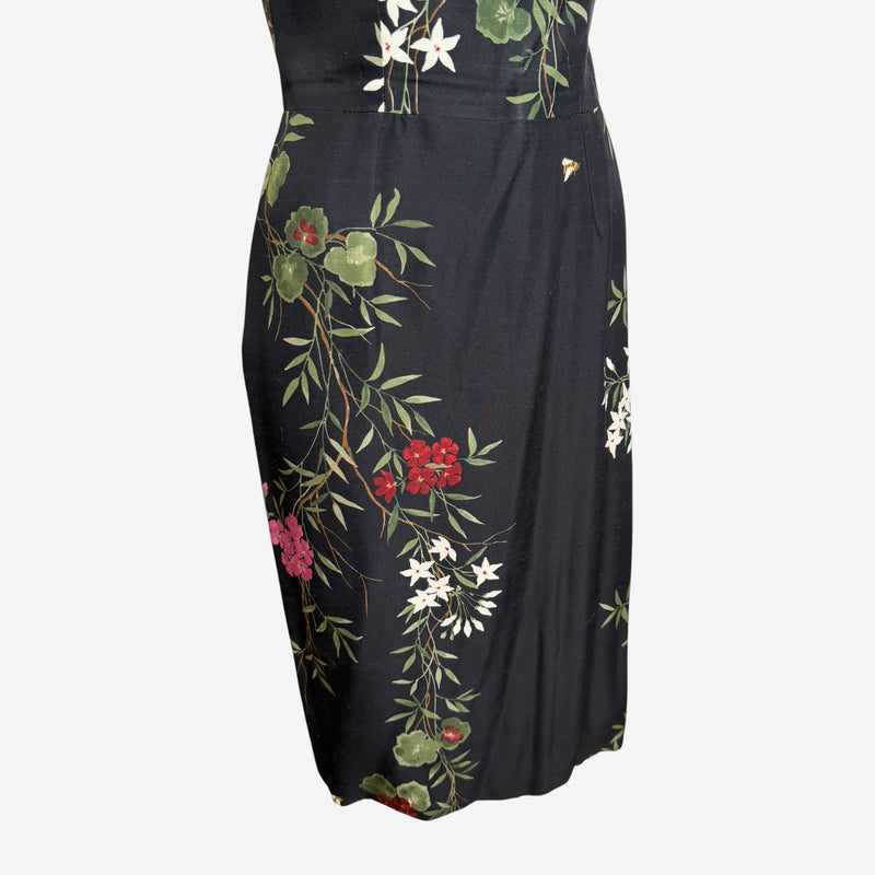 Black silk sheath dress by Dolce & Gabbana, fitted midi length with botanical print detail