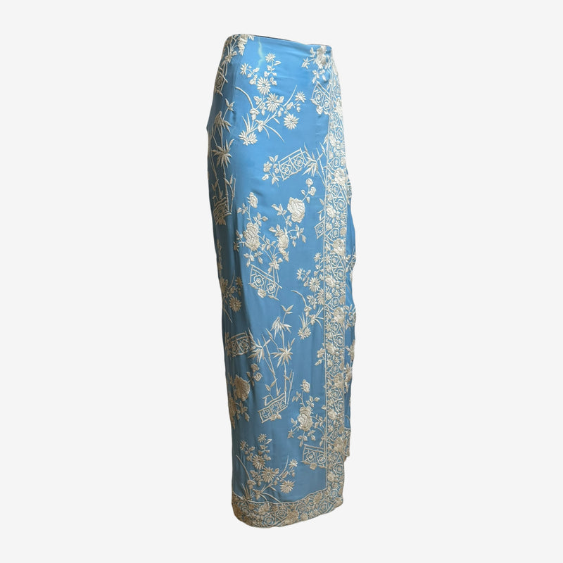 Powder blue silk wrap skirt by Dolce & Gabbana, side detail showing wrap construction