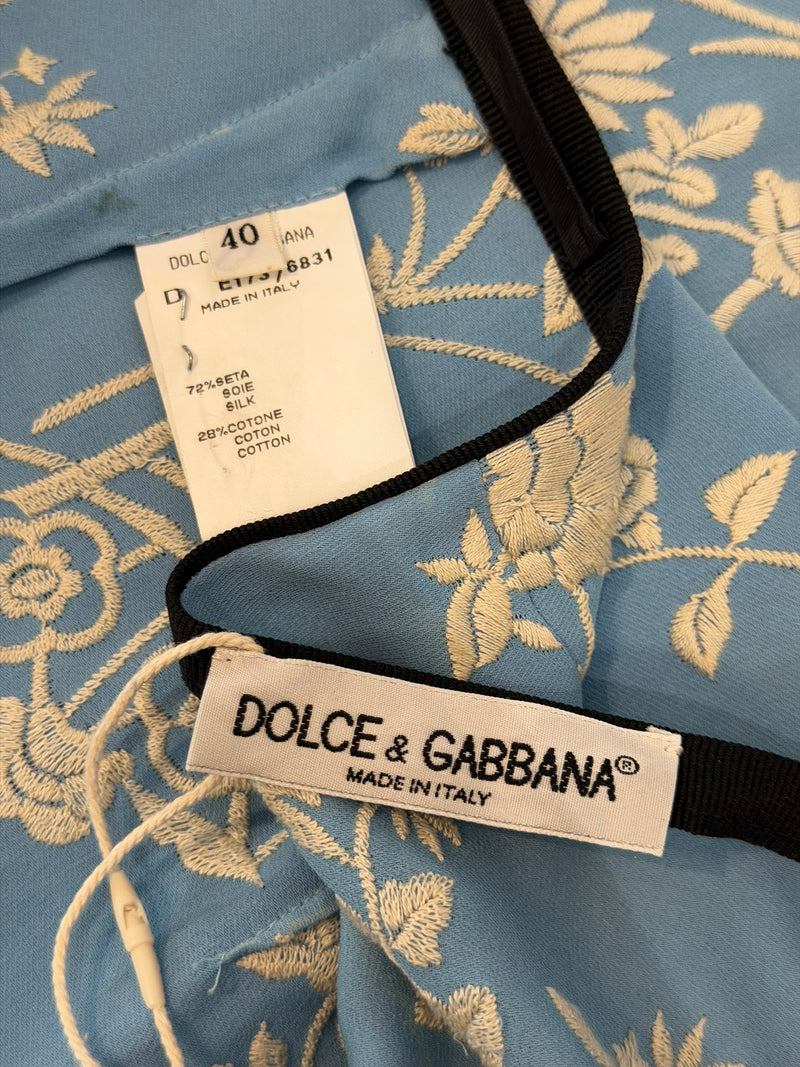 Powder blue silk wrap skirt by Dolce & Gabbana, full length view with tie closure