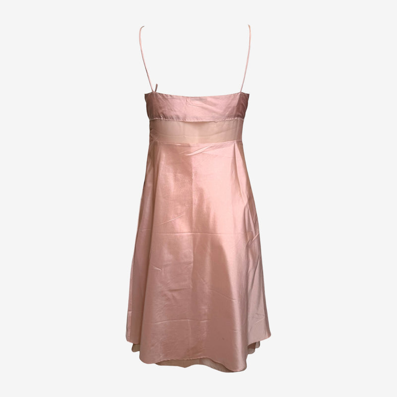 Adjustable shoulder strap detail on Miu Miu blush silk camisole dress with rose appliqué