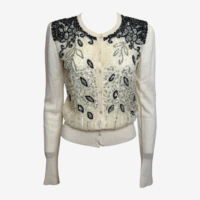 Cream cardigan by Blumarine with black and silver sequin floral motifs on front panel
