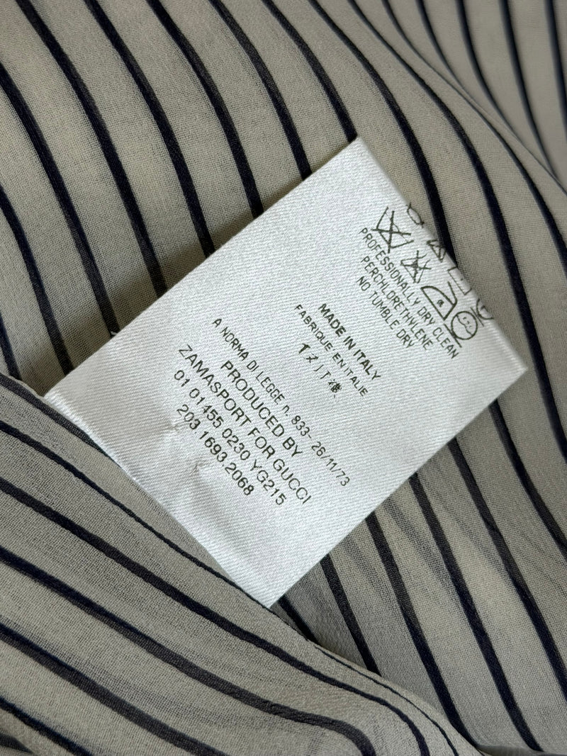 White and black striped silk wrap blouse by Gucci, fabric texture and stripe pattern