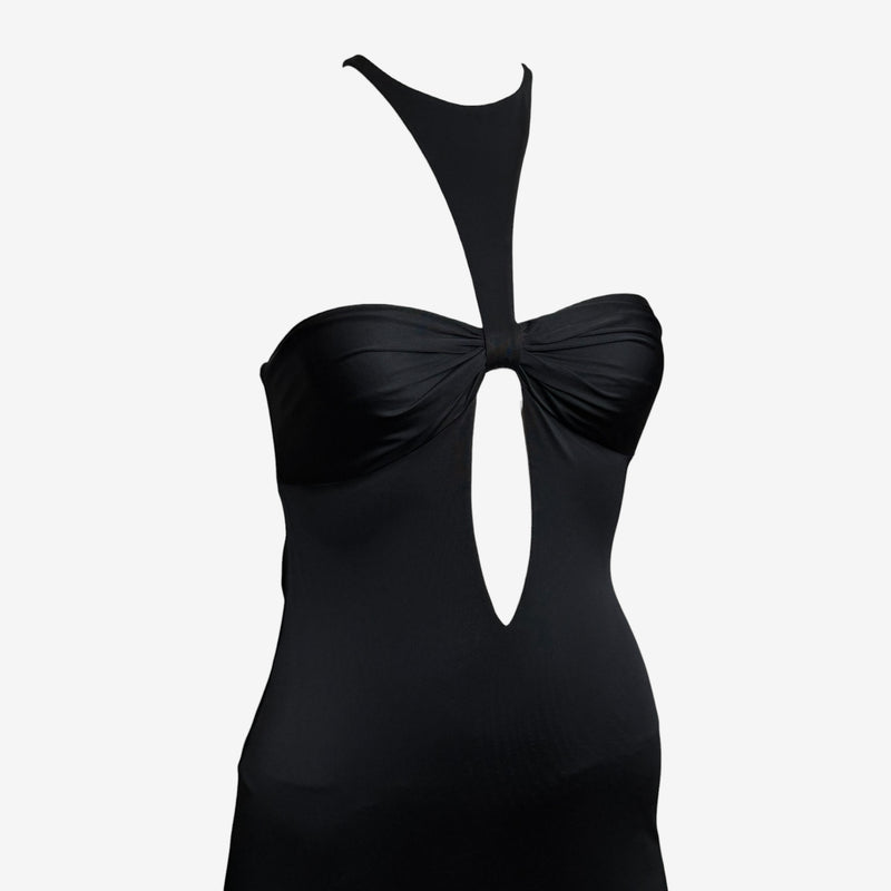 Black jersey halter gown by Gucci, side profile of floor-length silhouette