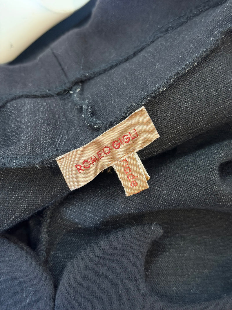 Black wool jersey cutout dress by Romeo Gigli, front detail of mock turtleneck