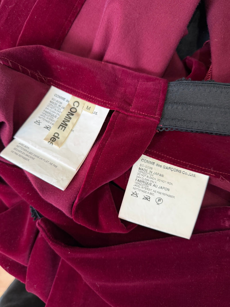 Comme des Garçons burgundy cotton velvet set laid flat, bustier and skirt together