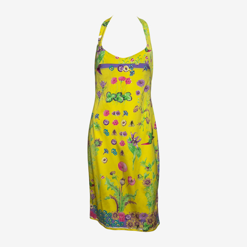 Yellow silk halter dress by Versace with botanical print and pink carnations, front view