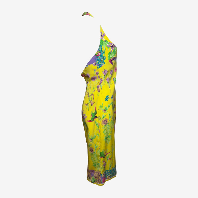Yellow silk halter dress by Versace, back view showing zipper closure and botanical motif
