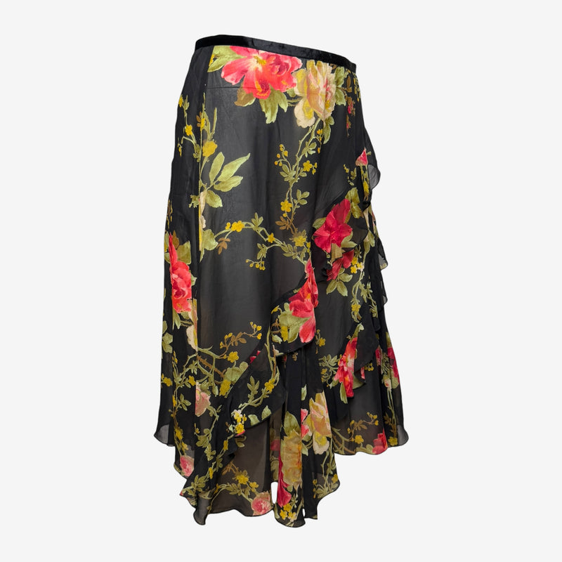 Blumarine wrap skirt side view showing cascading ruffle hemline and fluid fabric drape