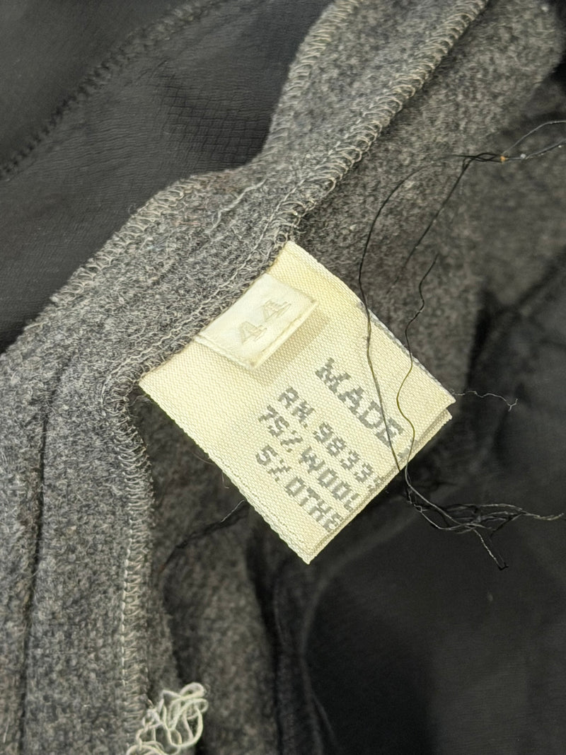 Miu Miu grey wool jacket, close-up of zip closure and tailoring