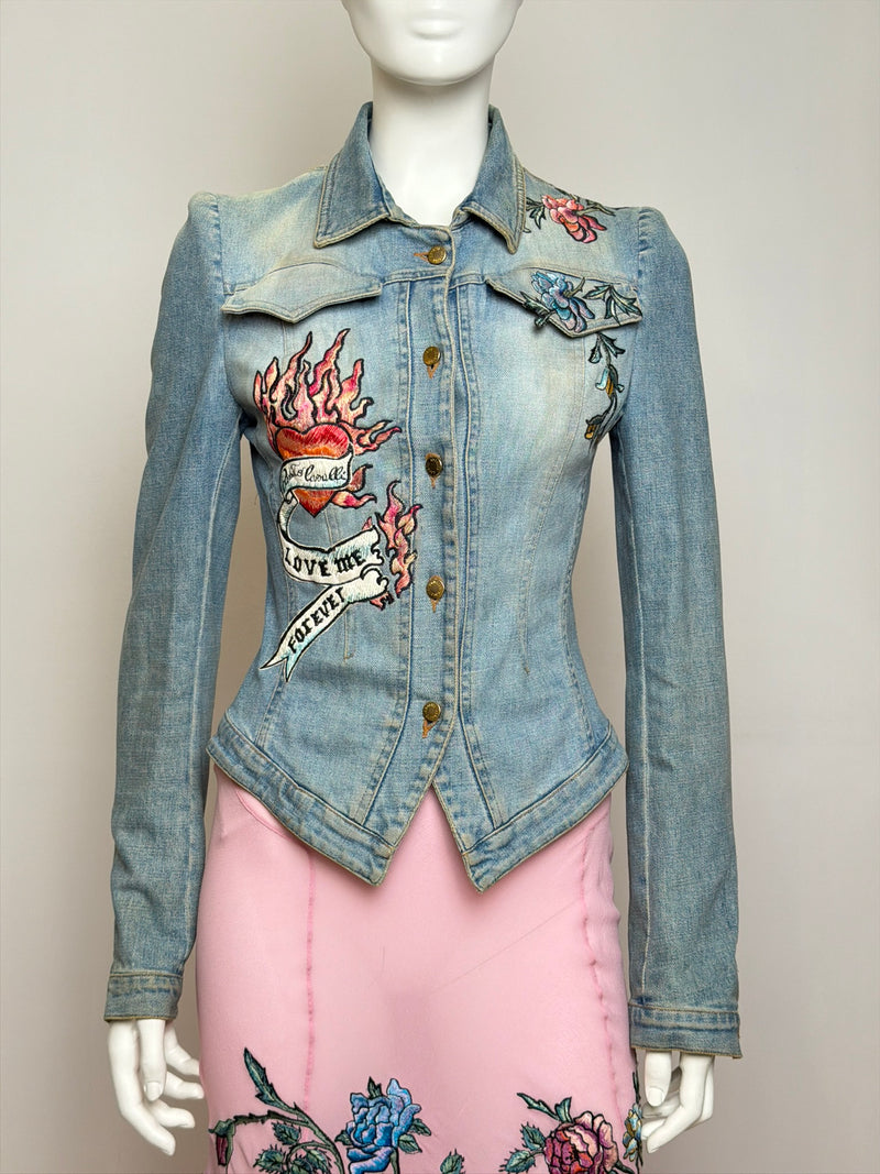 Roberto Cavalli denim jacket detail showing embroidered animal and tattoo embellishments