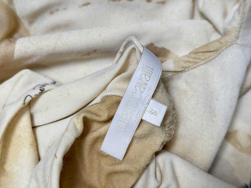 Fabric texture of Roberto Cavalli silk tattoo print dress